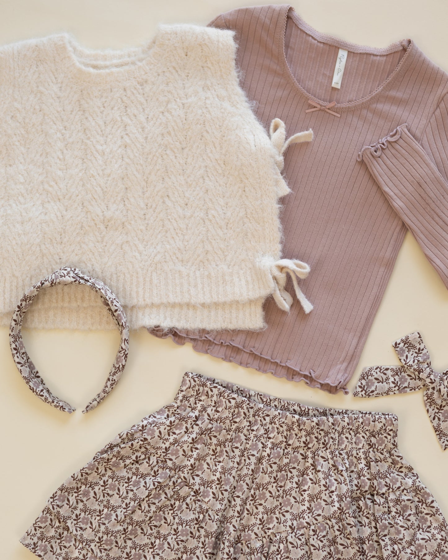 BOW SWEATER VEST IVORY